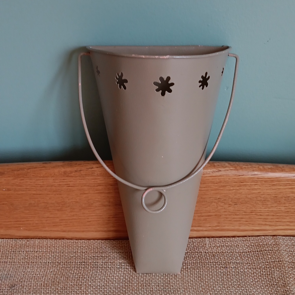 Metal pail wall decor